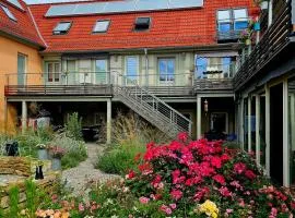 Wohnen im Dreiseitenhof mit Galerieschlafzimmer