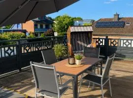 FeWo Auszeit eigene große Terrasse mit Strandkorb und Grill