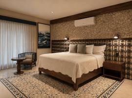 Hotel Travertino，位于梅里达的酒店