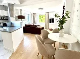 Smart Apartments - apartamenty z pięknym ogrodem i śniadaniami Ustronie Morskie
