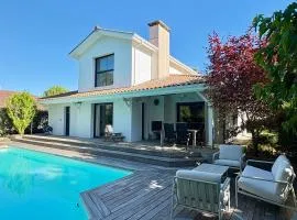 Villa SERENA Écrin de verdure et piscine chauffée