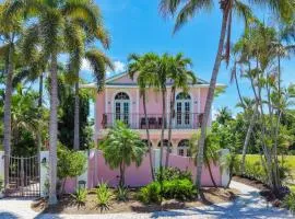Waterfront Pink House with Private Dock & Pool