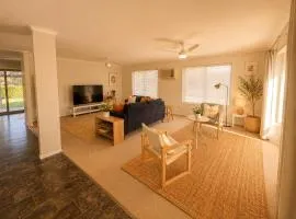 Spacious Home with Large Green Space Near Logan Hospital & Golf Resort