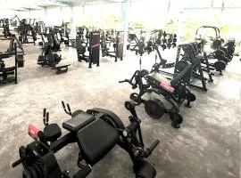 Sunny Gym and Apartments with a premium 24-hour gym