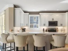 Barefoot Luxury 24: A spacious 4-bedroom retreat in scenic Bay Harbor, MI.