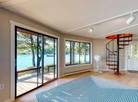 Delightful oceanfront home with amazing views, wrap-around deck & two fireplaces