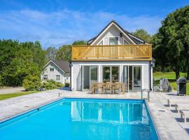 12 person holiday home in BÅSTAD-By Traum，位于巴斯塔德的酒店