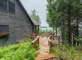 Gorgeous lakefront home w/ dock, canoe, kayaks & lake/forest views