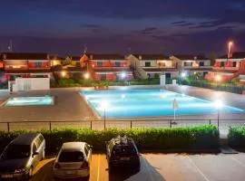 HOTELAPARTMENTS- VILLAGGIO DEI FIORI EXTRA LUXURY 4 STARS - Great Family Resort - Petz Friendly - with Hypermarket - Delivery Restaurant-Pizzeria - Room Breakfast with supplement - Ultra Fast WI-FI - Parking adjacent to the Room - with Mechanical Workshop