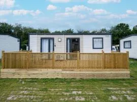 Comfortable caravan in a green setting