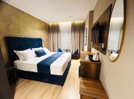 Hotel Shopi Residence，位于爱尔巴桑的酒店