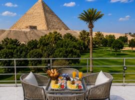 Glow Pyramids View Hotel，位于开罗的酒店