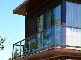 wooden challet with city view