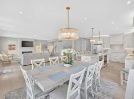 7BR Bay Harbor retreat with waterfront access, pool, hot tub & fireplace