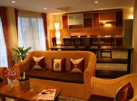 托尔马季家庭公寓酒店，位于奥南海滩的公寓