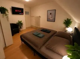 Room near the train station with large kitchen