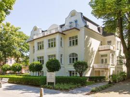 Ferienwohnungen am Strand - Strandvilla Belvedere，位于奥斯赛拜-屈隆斯博恩的酒店