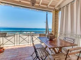 Seaview stone apartment in Ipsos Beach