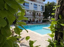 Mexhe Hotel El Cuyo,位于埃尔库约的酒店