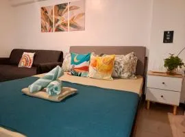 Affordable Family Studio Condo near Mactan Airport by A&C