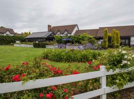 米克奥西斯酒店，位于Hackham的酒店