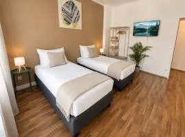 Gemütliches Apartment mit 2 Schlafzimmer, bequemen Boxspringbetten, Essbereich, Balkon, Self Check-in