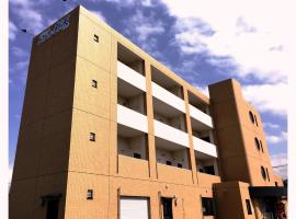 奚丹商务酒店 ，位于伊万里市的酒店