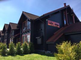 拉库米加酒店，位于利加特内的酒店