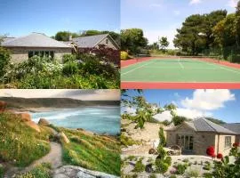 Putsborough Manor 3 Self Catering Cottages with Beach a short walk dog friendly all year, On site Tennis, Play Area, Paddock, Spa baths, BBQ, Private Gardens, Superfast WIFI