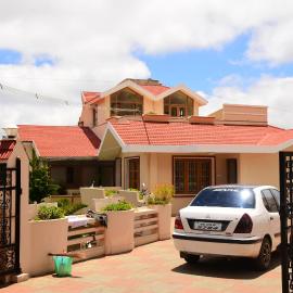 Rainbow Cottages-Budget Friendly rooms,位于乌提的酒店