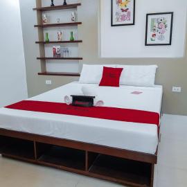 RedDoorz @ Caimito Drive Dampas，位于塔比拉兰的酒店