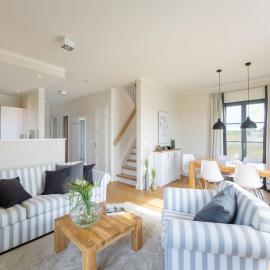 Reetland am Meer - Premium Reetdachvilla mit 3 Schlafzimmern, Sauna und Kamin E05，位于德兰斯克的酒店