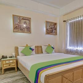 Treebo Komfort Suites, 3 Km From Mysore Palace，位于迈索尔的酒店