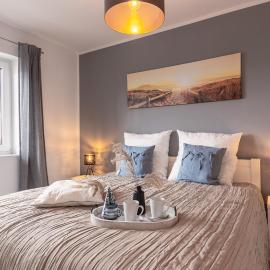 Ferienhaus Sonneneck am Harkebrügger See mit Sauna，位于Barßel的酒店