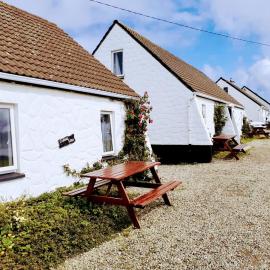Doonbeg Holiday Cottages，位于敦贝格的酒店
