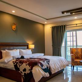The Roomy Lodge, Murree，位于穆里的酒店