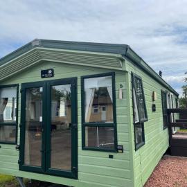 2-Bedroom Caravan Located in Uddingston, Glasgow at Maryville Caravan Site，位于阿丁斯顿的酒店