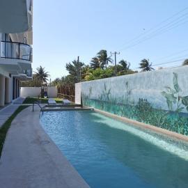 Condo vista al mar, alberca rooftop Chixchulub，位于希克苏鲁伯的酒店