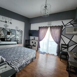 Condo Azur Suites A125 Amani Resorts Residences , 5 minutes Airport, Netflix, Stylish, Cozy with Luxurious Swimming Pool，位于Pusok的酒店