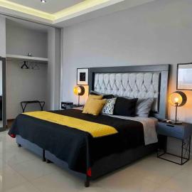 Suites La Gloria Alojamiento independiente,位于特帕蒂特兰的酒店