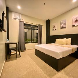 Rudolfo Suites，位于罗哈斯城的酒店