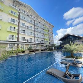 Travelers Delight Amani Grand Resort Residences 3-5mins from airport，位于麦克坦的酒店