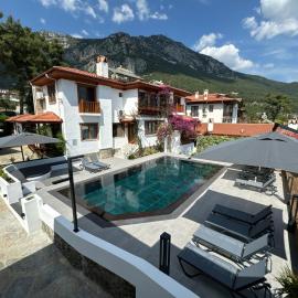 Tomsan Suites & Villas Akyaka，位于阿奇亚卡的酒店