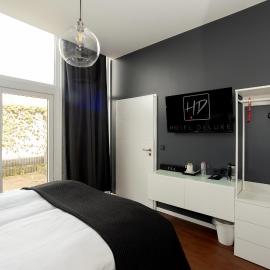 Hotel Deluxe，位于多斯滕的酒店
