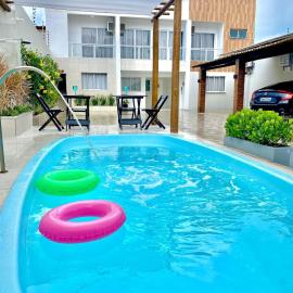 Village Caranguejo - FLAT 02 Quartos，位于阿拉卡茹的酒店