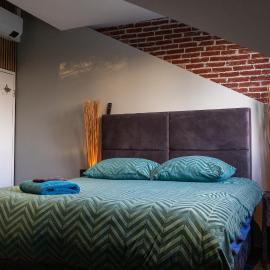 Koraal - Comfortabele kamer bij B&B Gezond aan Zee - Exclusief Wellnesstuin