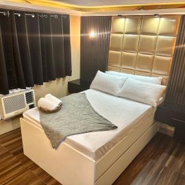 IV’s Condo w/ Netflix and Wi-Fi，位于Cainta的酒店
