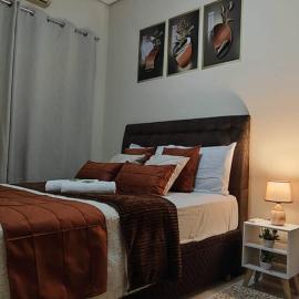 Casa Completa, luxo, 3 Quartos, Ar condicionado, garagem，位于陶巴特的酒店