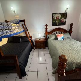 Chalet Belizomi - Le Gardenia Room，位于洛尼湾村的酒店