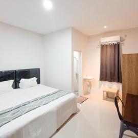 Happy Family Homestay Jember Mitra RedDoorz，位于任抹的酒店